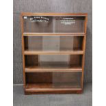 A 1970's mahogany stacking bookcase, H. 121cm, W. 89cm.