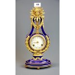 A Franklin Mint Marie Antoinette mantle clock by The Victoria and Albert Museum with key, H. 39cm.