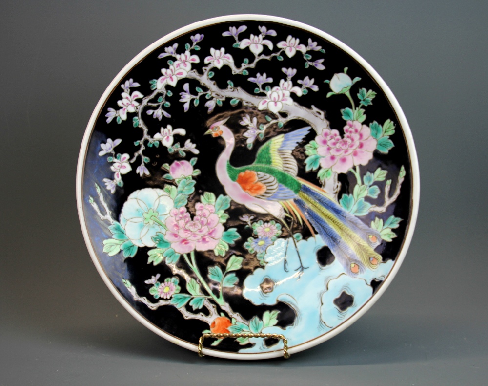 A 19th century Chinese and enamelled porcelain charger, Dia. 36.5cm.