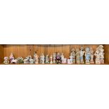 A quantity of Victorian porcelain figurines etc.