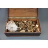 A Victorian veneered box containing an extensive collection of antique keys.