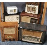 A group of six bakelite and other radios.