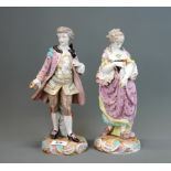 A pair of 19th century German porcelain figurines, H. 28cm.