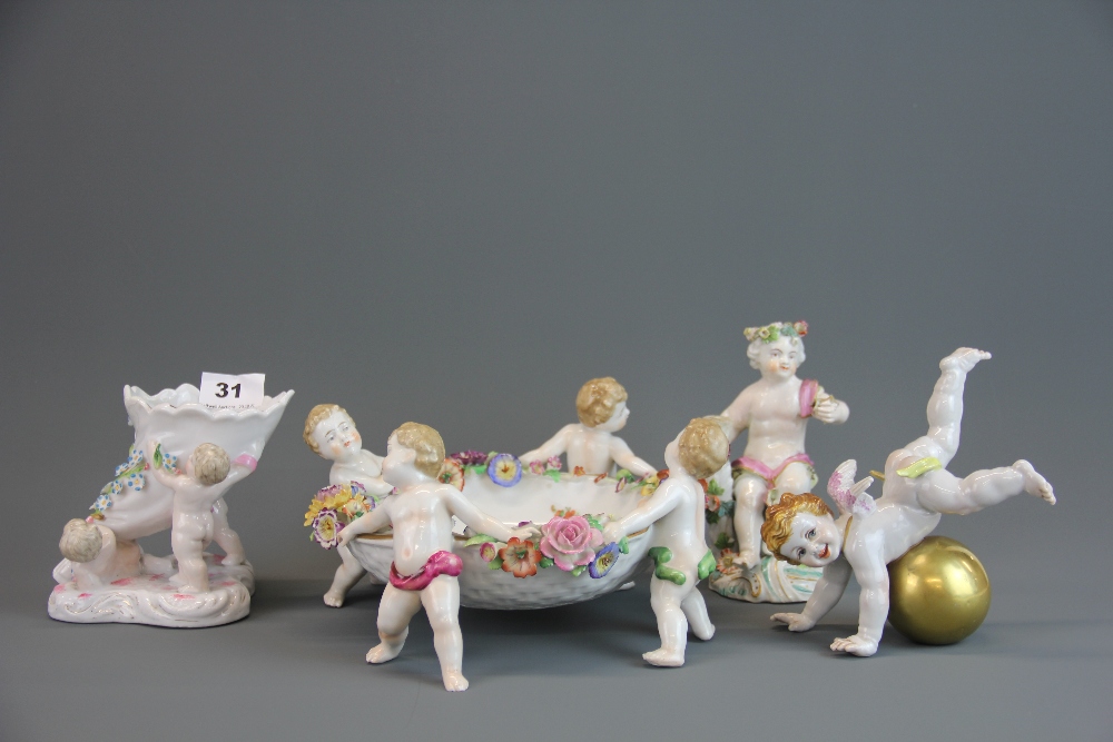 A group of 19th century and later porcelain cherub items. Condition: some repair.