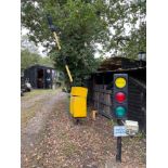 A useful traffic light and electric barrier.