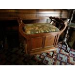 A Victorian mahogany piano stool.