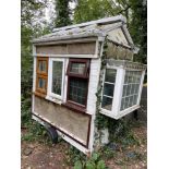 One of George Clarke's small spaces? An old double glazing display on trailer.