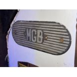 A metal MGB sign, L. 32cm.