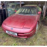 A Ford Probe, 92,000 miles with log book.