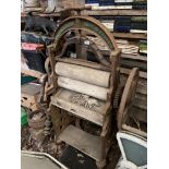 An antique cast iron mangle.