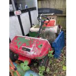 A vintage golf cart.