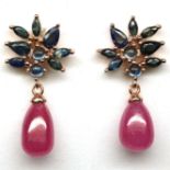 A pair of 925 silver rose gold gilt drop earrings set with cabochon cut rubies and marquise cut