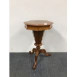 A 19th century walnut veneered lady's sewing table, H. 68cm.