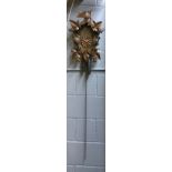 A carved wooden Black Forest cuckoo clock, H. 50cm.