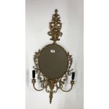 A brass mirror wall light, H. 94cm.