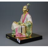 An Italian Limited edition 807/2000 gilt and hand painted porcelain figure by Edoardo Tasca with