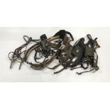 A quantity of antique working horse harness.