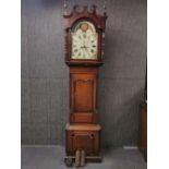 An 18th century oak and mahogany veneered long cased clock by Wiston from Stafford with striking