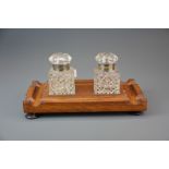 A Victorian oak and cut crystal ink stand. Size 29 x 16 x 14cm.