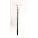A lovely oriental carved bone handled walking stick, handle L. 11cm.