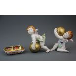 Two Spanish Algora porcelain cherub figures with a Crown Derby dish, tallest figure H. 13cm.
