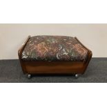 A G-plan saddle footstool, 63 x 51.5 x 32cm.