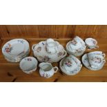 A 1930's Crescentware 'Junetime' pattern extensive part tea set.