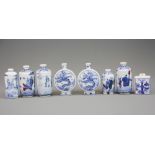 A group of eight Chinese hand painted porcelain snuff bottles, tallest H. 9cm.