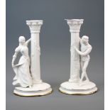 A pair of Franklin Mint fine porcelain candlesticks of Romeo and Juliet, H. 25cm.
