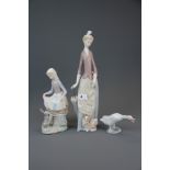 Three Lladro figurines, tallest H. 35cm.