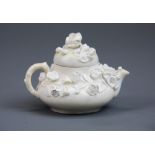 An early creamware miniature teapot, H. 8cm.