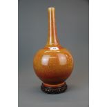 An unusual Chinese yellow and red crackle glazed porcelain vase, H. 39cm. Together with carved