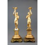 A pair of French empire style gilt bronze table lamp bases, H. 49cm.
