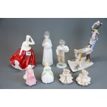 A group of Royal Doulton, Nao and other porcelain figurines.