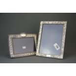 Two hallmarked silver photo frames, sizes 16 x21cm and 14 x 18cm.