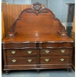 An unusual 19th century stained oak veneered, serpentine fronted eight drawer sideboard, W.181 x