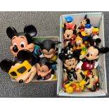 A collection of vintage Disney hard plastic figures of Mickey Mouse etc.