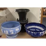 A Wedgwood fruit bowl with a Beswick and a Doulton fruit bowl.