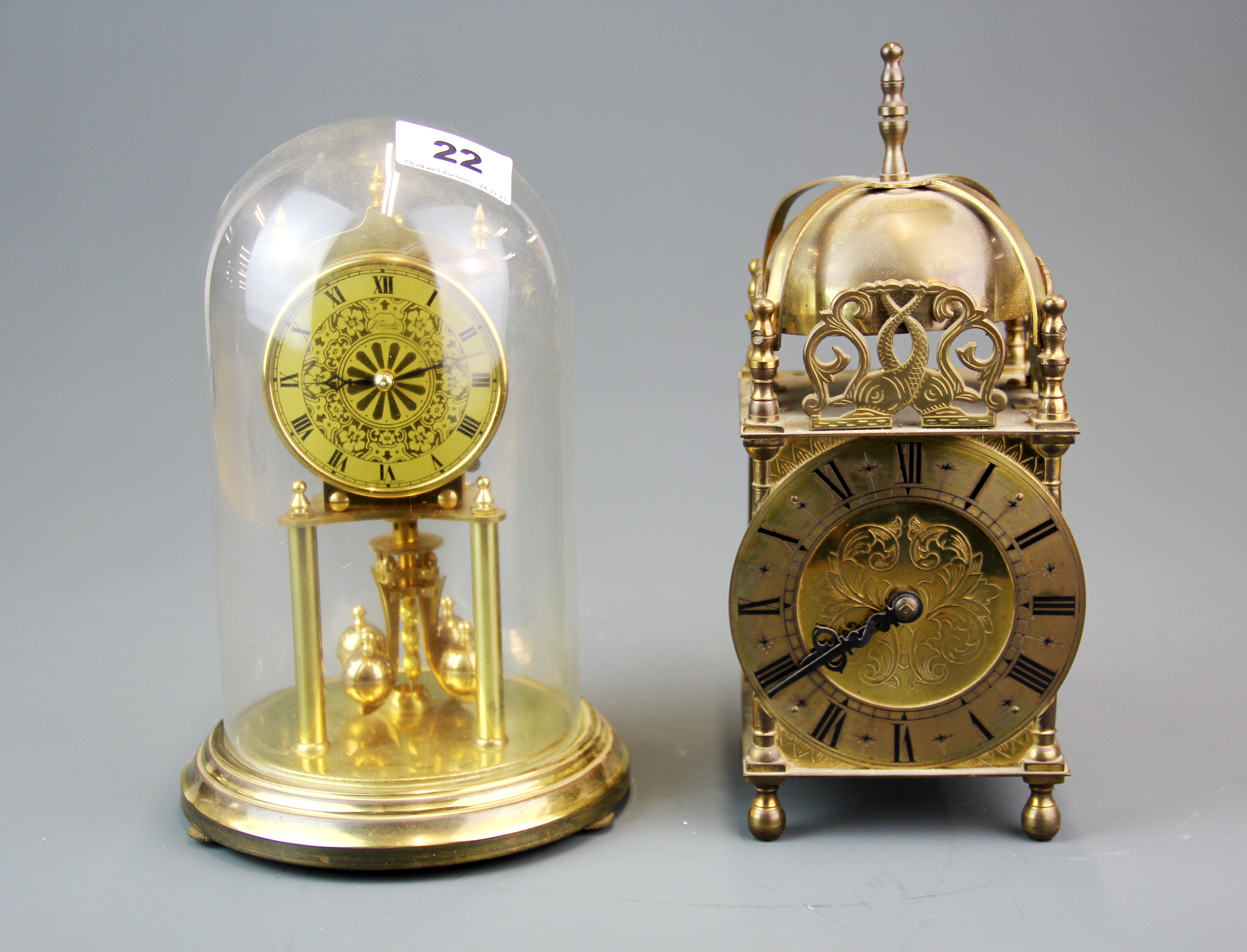 A Smiths brass lantern clock with original mains electric movement (currently not wired) together