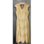 A vintage beaded satin dress.