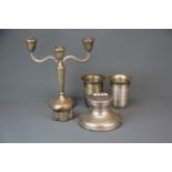 A hallmarked silver Capstan inkwell, Dia. 13cm, a hallmarked silver candelabrum, together with two