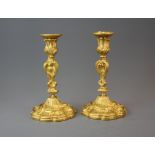 A pair of 19th century gilt bronze candlesticks, H. 23.5cm.