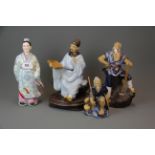 A group of mid 20th century Chinese glazed ceramic figures, tallest H. 25cm.