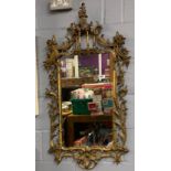 An 18th century Chinese Chippendale style carved giltwood mirror, 59 x 107cm.