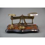 An antique post office scale and weights, L. 17cm.