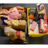 A quantity of vintage dolls and toys.