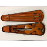 An antique cased violin with three bows, with a hand written label reading Emanuel Whitmarsh, London