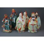 A group of six large mid 20th century Chinese porcelain figures of lucky gods, largest H. 35cm.