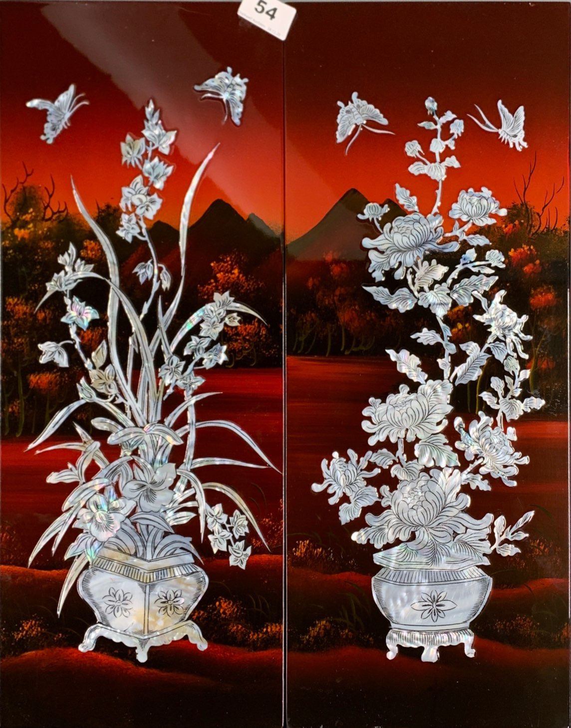 A pair of oriental mother of pearl and lacquer panels, H. 49cm.