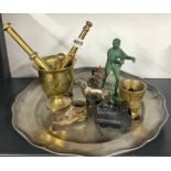A pewter tray and other metal items.